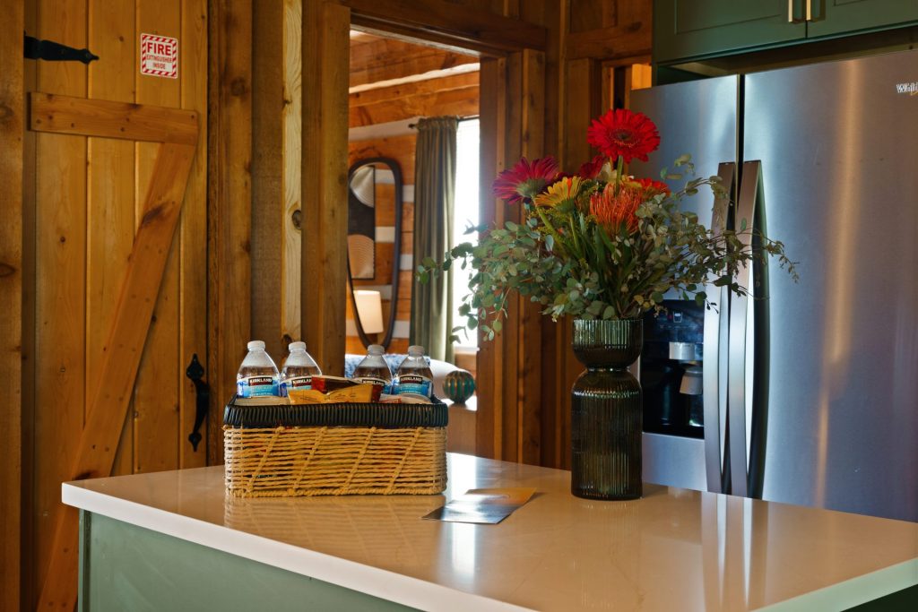 Kitchen island with flowers at Dancing Embers cabin