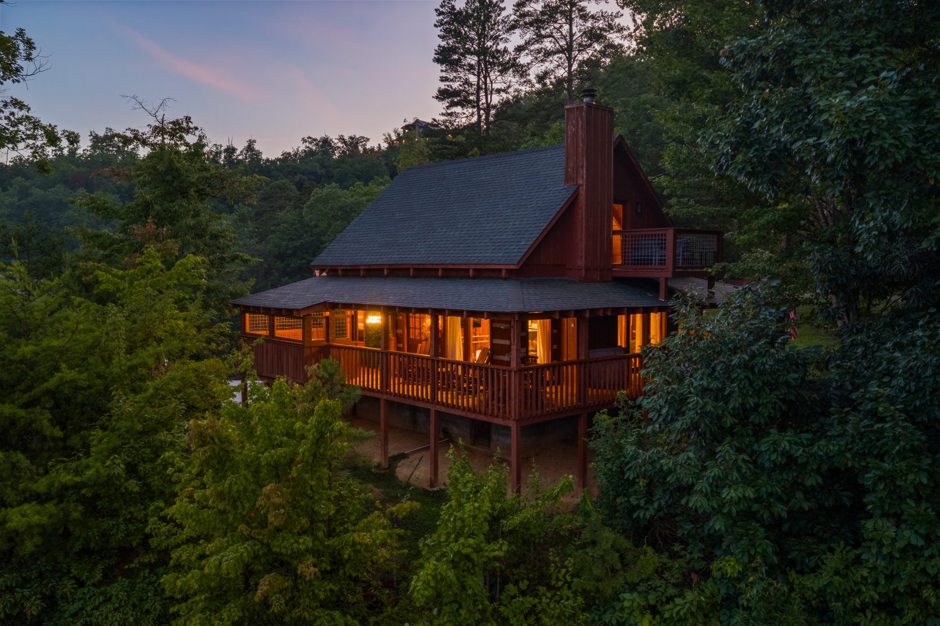 Twilight aerial view of Dancing Embers cabin in the Smoky Mountains