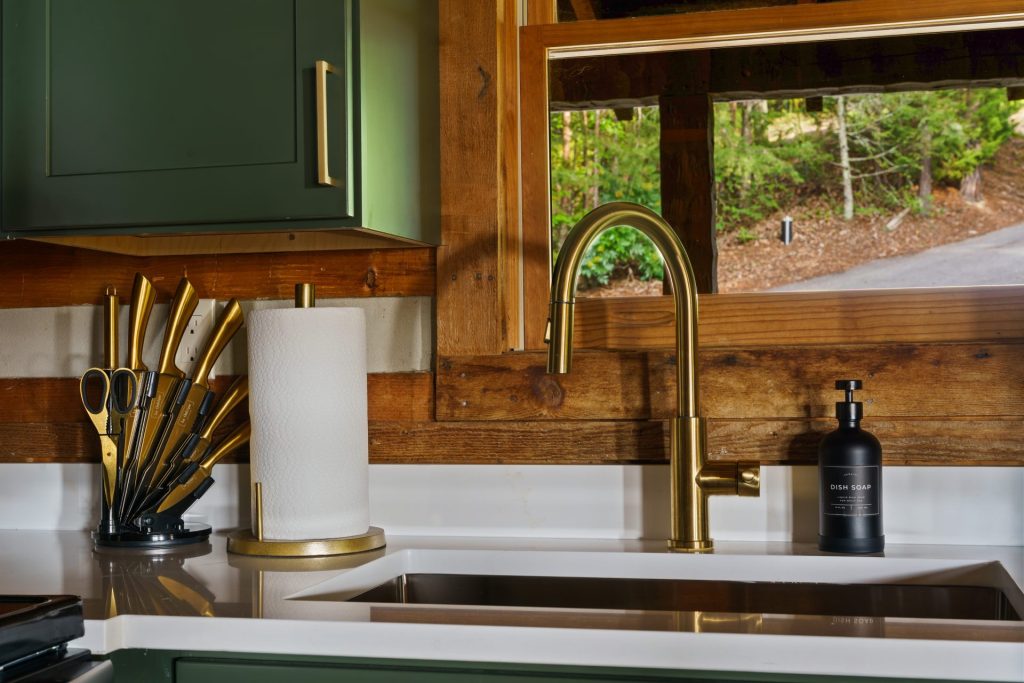Kitchen sink with window view at Dancing Embers cabin