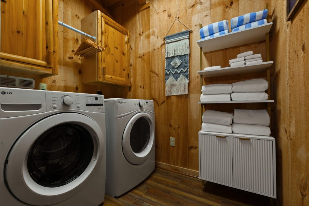 Laundry room with washer and dryer at Dancing Embers cabin
