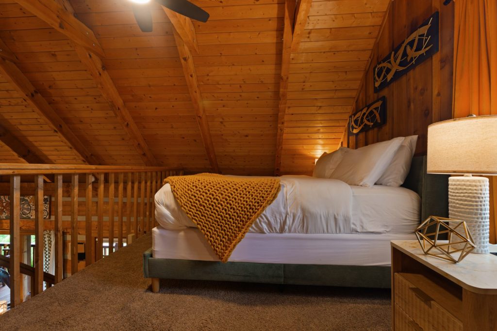 Wide view of loft bedroom at Dancing Embers cabin