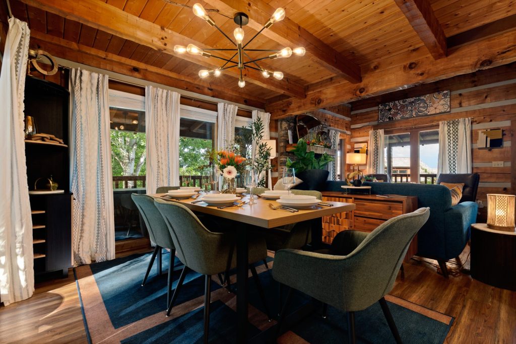 Dining table with curtains at Dancing Embers cabin