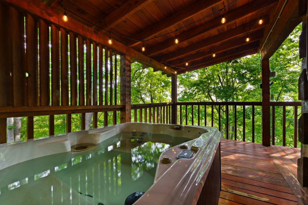 Close-up of the private hot tub at Nestled Oaks cabin